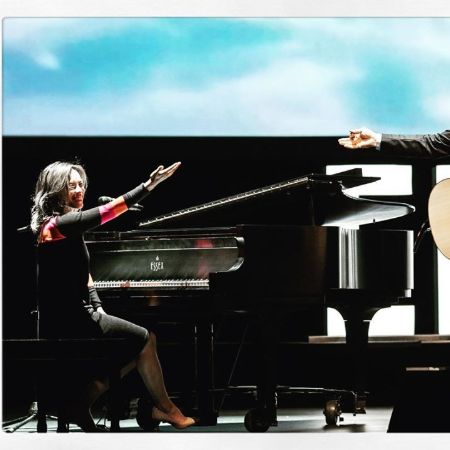 Emm while Performing in a concert